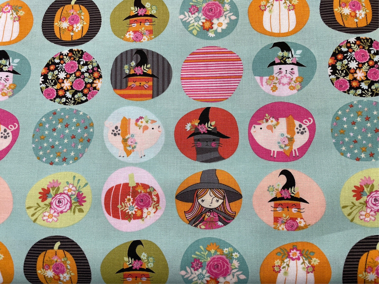 Kitty Loves Candy Halloween Poppie Cotton Fabric   Round motif  Aqua Background  Priced by the Half Yard   cut continuously